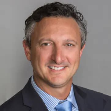 Dr. Christopher V. Carani